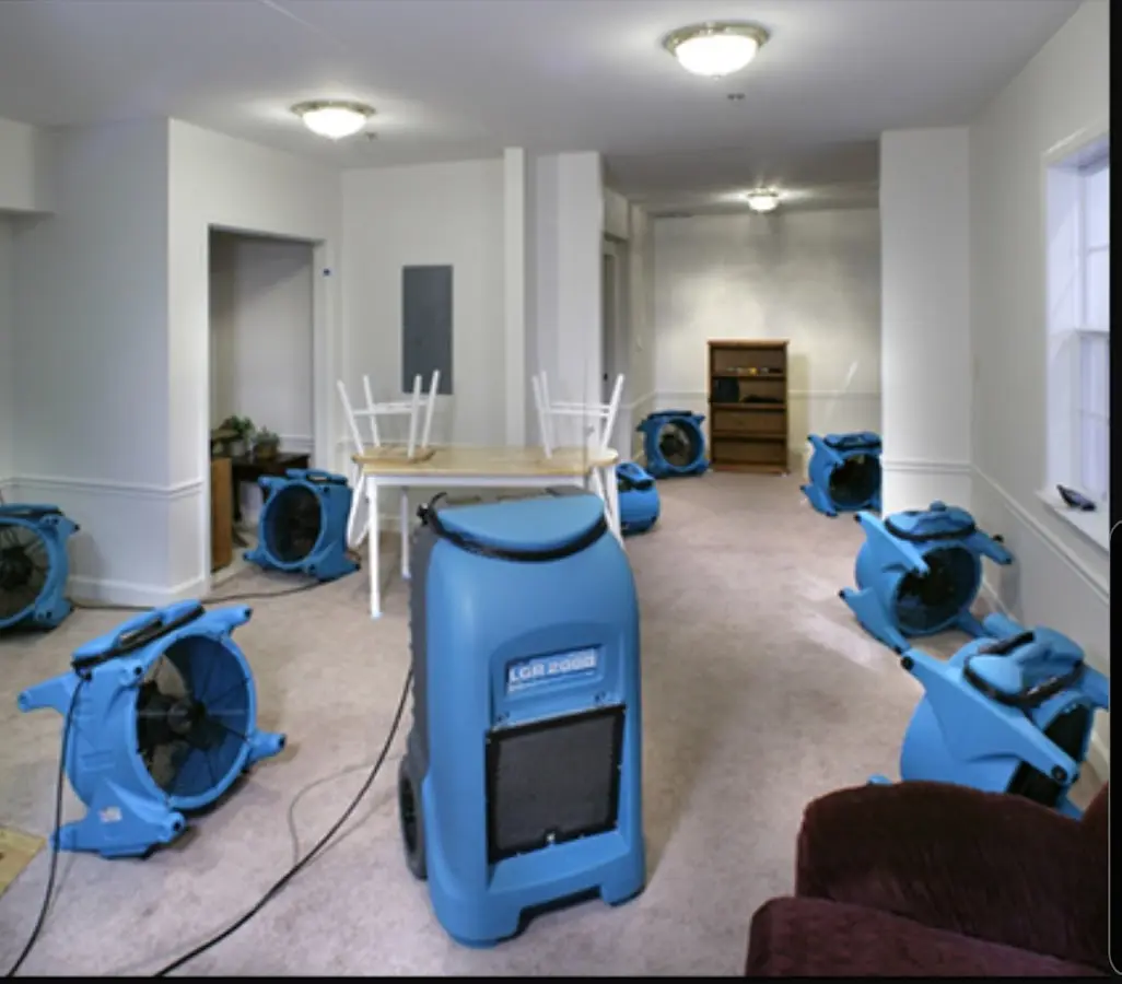 Air movers and dehumidifier setup for Water Damage Restoration in Difficult Run